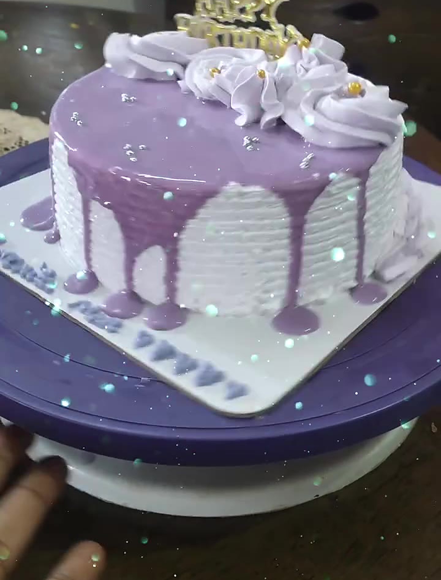 Blackcurrant drip cake with buttercream roses